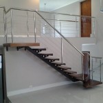 Cable system mounted on wooden stair treads